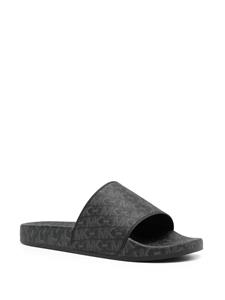 Michael Kors Jake slippers met monogram - Zwart