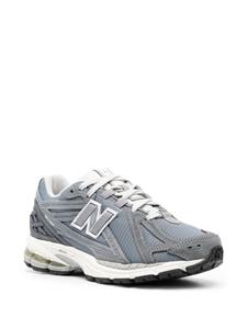 New Balance 1906R sneakers met logopatch - Grijs