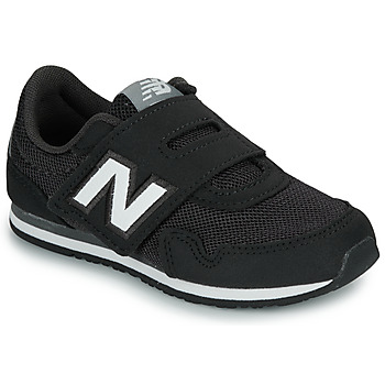 New Balance Lage Sneakers  323