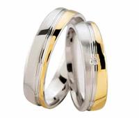 Christian Bicolor trouwringen met diamant geel goud