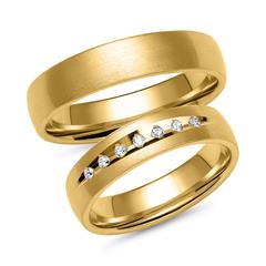 Unique Gouden trouwringen met 7 diamanten