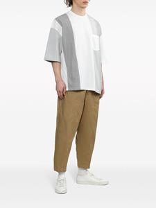 Comme des Garçons Homme tapered-leg cropped trousers - Beige