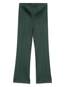 Pleats Please Issey Miyake plissé-effect slim-cut trousers - Groen