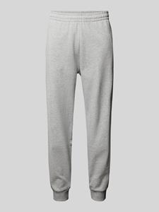 REVIEW Relaxed fit sweatpants met labeldetail