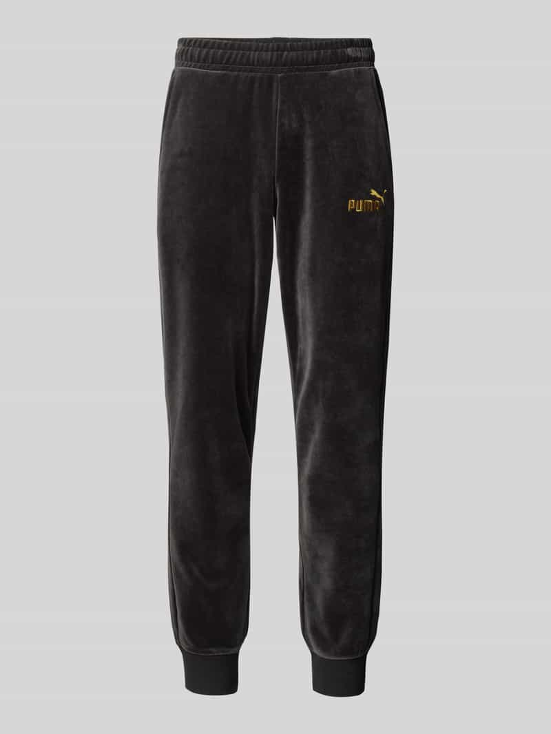 PUMA PERFORMANCE Relaxed fit sweatpants met labelstitching, model 'Velvettrack'