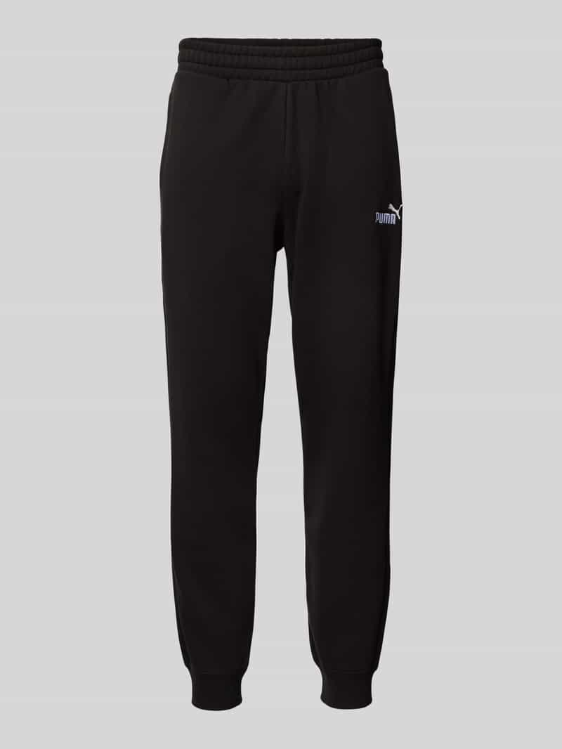 PUMA PERFORMANCE Sweatpants met logostitching