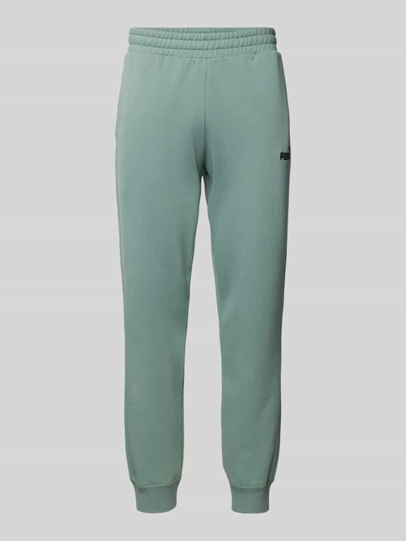 PUMA PERFORMANCE Sweatpants met labelstitching