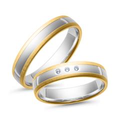 Unique Trouwringen geel en witgoud met Diamanten breedte 4,5 mm