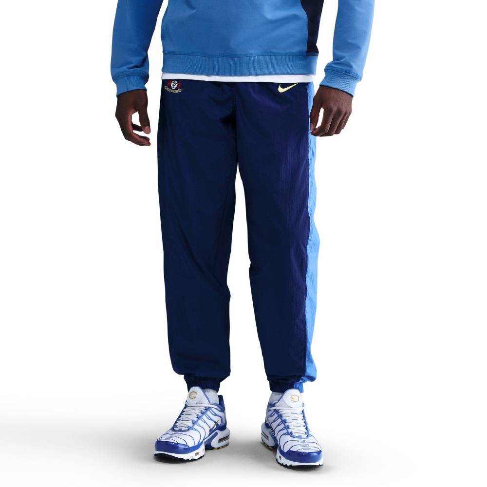 Nike Tottenham Hotspur Total 90 Trainingsbroek Woven 2025-2026 Donkerblauw Blauw Felgeel