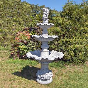 Gartentraum.de Dreistufiger Kaskaden Brunnen für den Garten aus Steinguss - Junge mit Fisch Figur - Marino / Antikia
