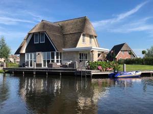 Luxe 8 pers. watervilla met Finse sauna en volledig ingericht vlonderterras aan het water - Nederland - Europa - Delfstrahuizen