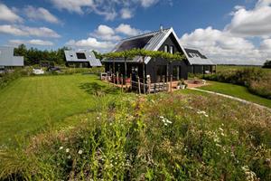 Modern 8-persoons vakantiehuis op een familiepark met zwemvijver in Sint-Nicolaasga - Nederland - Europa - Sint Nicolaasga