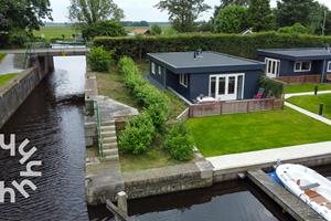 Aan de rivier de Tjonger gelegen 4 pers. vakantiehuis inclusief boot in Bantega, Friesland - Nederland - Europa - Schoterzijl