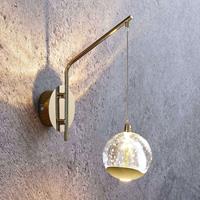 Lucande LED-Wandlampe Hayley m. hängender Kugel, gold