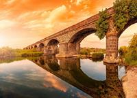 Papermoon Fotobehang Ancient river Arches Cedrino