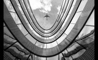 Papermoon Fototapete »Flugzeug über Gebäude«, samtig, Vliestapete, hochwertiger Digitaldruck, inklusive Kleister