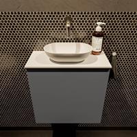 Mondiaz Fowy toiletmeubel 50x50x23cm dark grey mat 0 kraangaten wasbak: midden 1 deur solid surface met blad MDF kleur wasbak: wit FOWY59006darkgreytalc