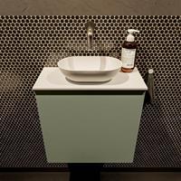Mondiaz Fowy toiletmeubel 50x50x23cm army mat 0 kraangaten wasbak: midden 1 deur solid surface met blad MDF kleur wasbak: wit FOWY59006armytalc
