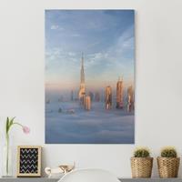 Bilderwelten Leinwandbild Architektur & Skyline - Hochformat Dubai über den Wolken