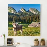 Bilderwelten Leinwandbild Berg - Quadrat Schweizer Almwiese mit Kuh