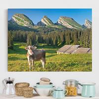 Bilderwelten Leinwandbild Berg - Querformat Schweizer Almwiese mit Kuh