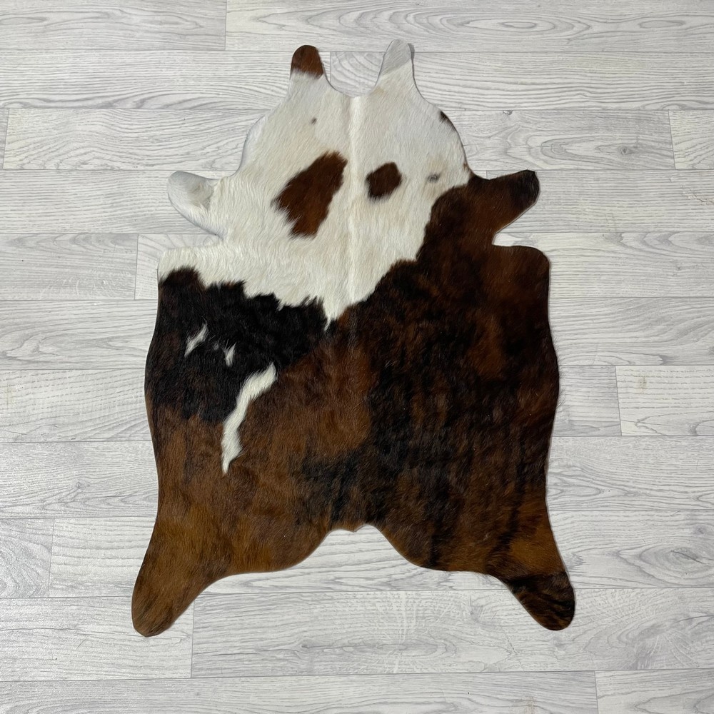 Lederstore Kleine koeienhuid bruin wit zwart (Normandiër) 90x60cm