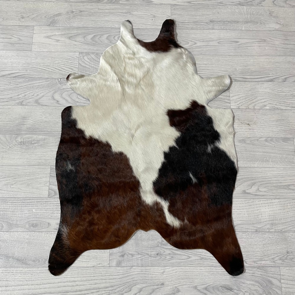 Lederstore Kleine koeienhuid bruin wit zwart (Normandiër) 90x60cm