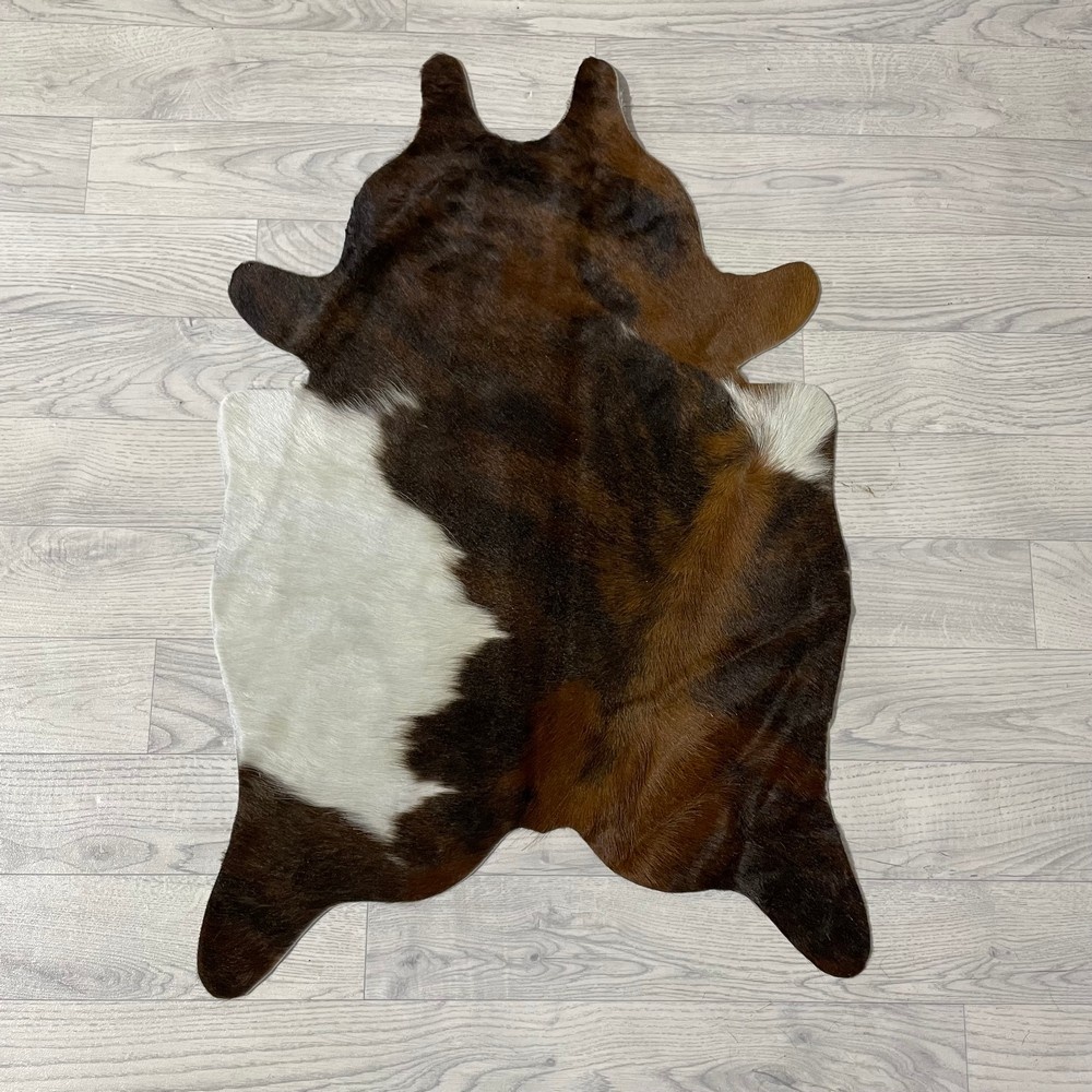 Lederstore Kleine koeienhuid bruin wit zwart (Normandiër) 90x60cm