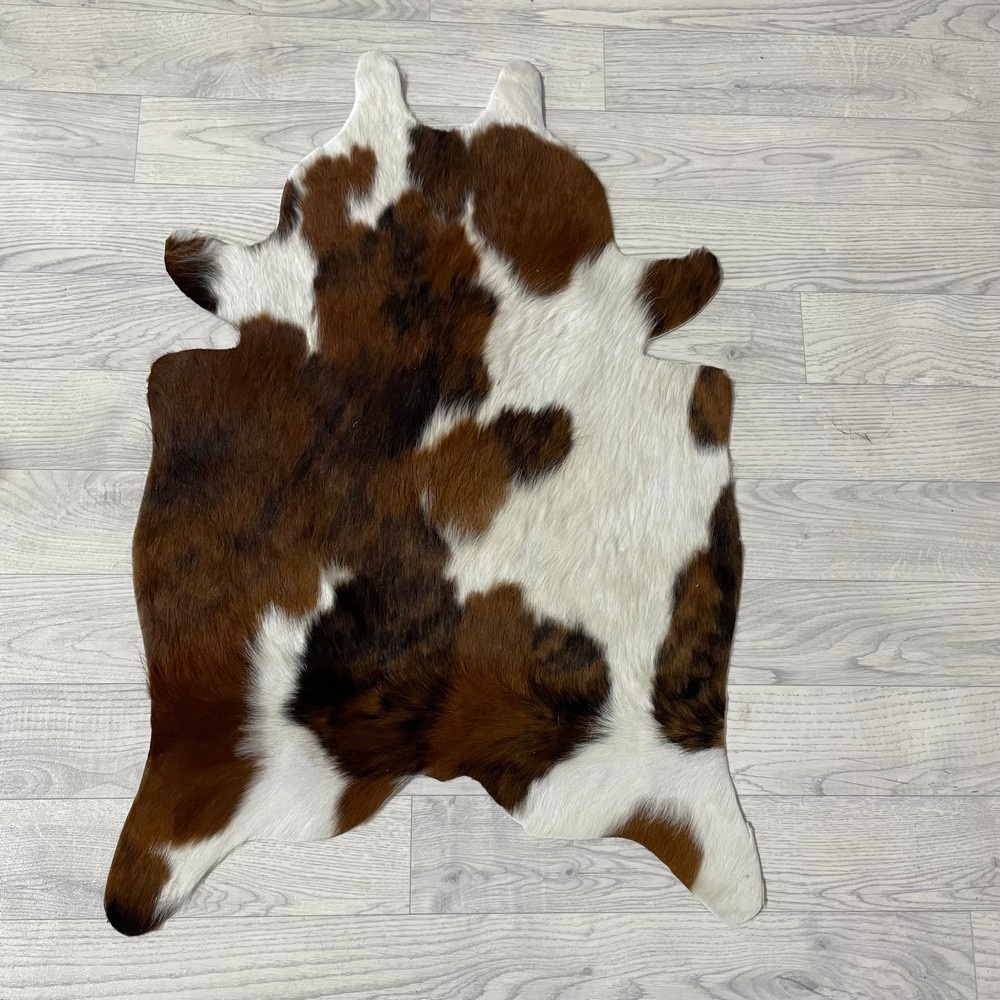 Lederstore Kleine koeienhuid bruin wit zwart (Normandiër) 90x60cm