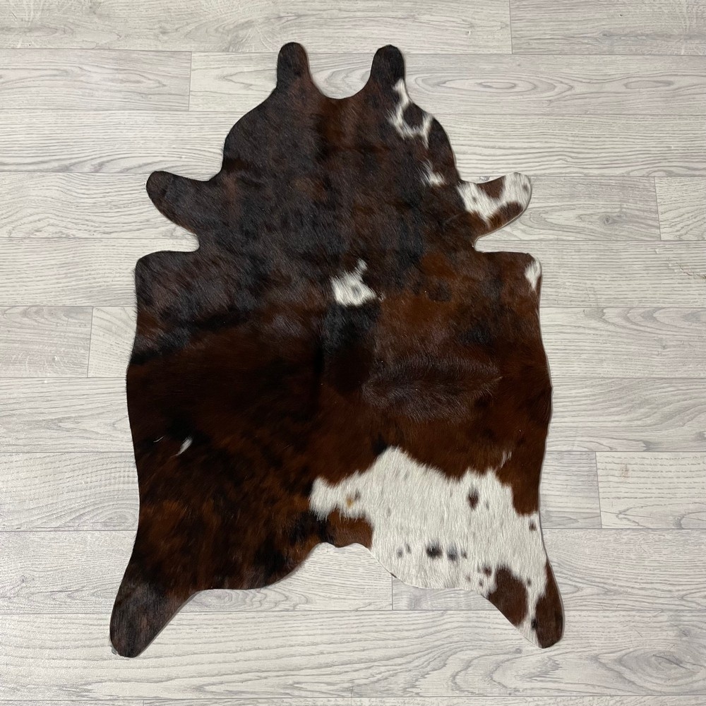 Lederstore Kleine koeienhuid bruin wit zwart (Normandiër) 90x60cm