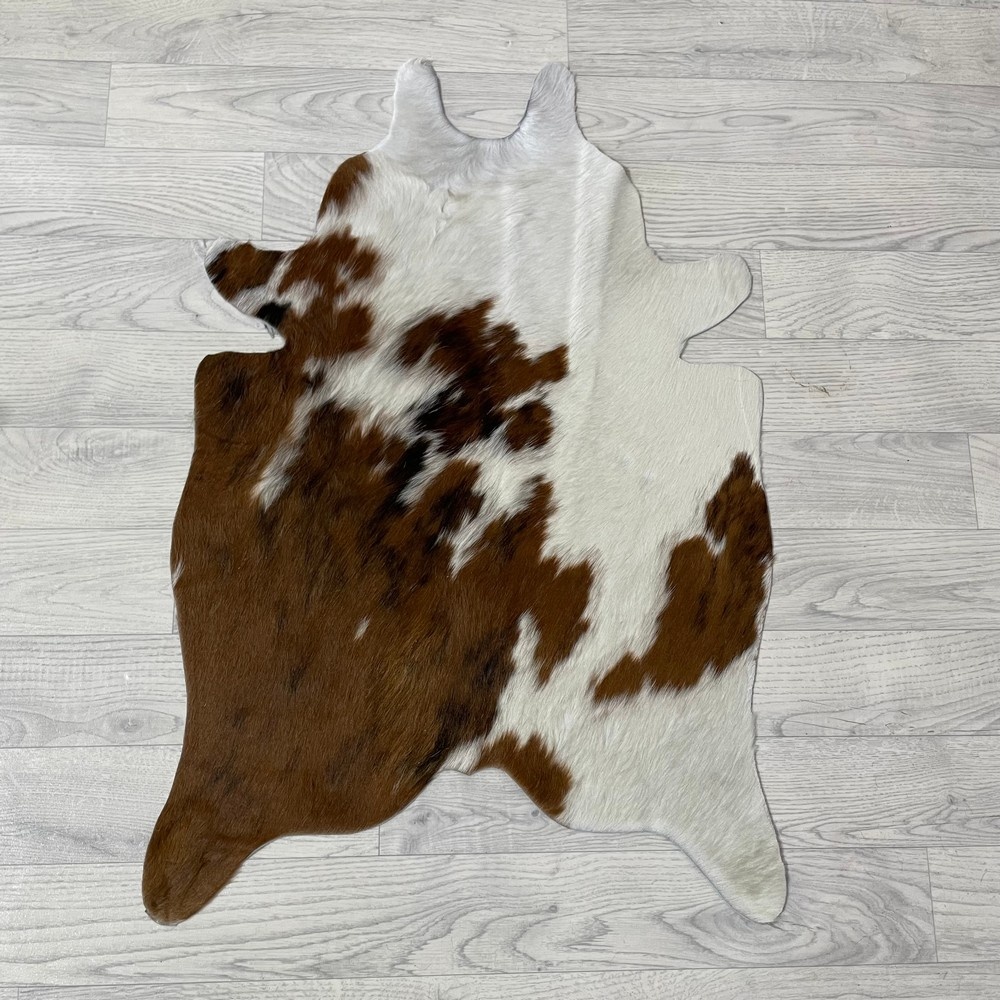 Lederstore Kleine koeienhuid bruin wit zwart (Normandiër) 90x60cm