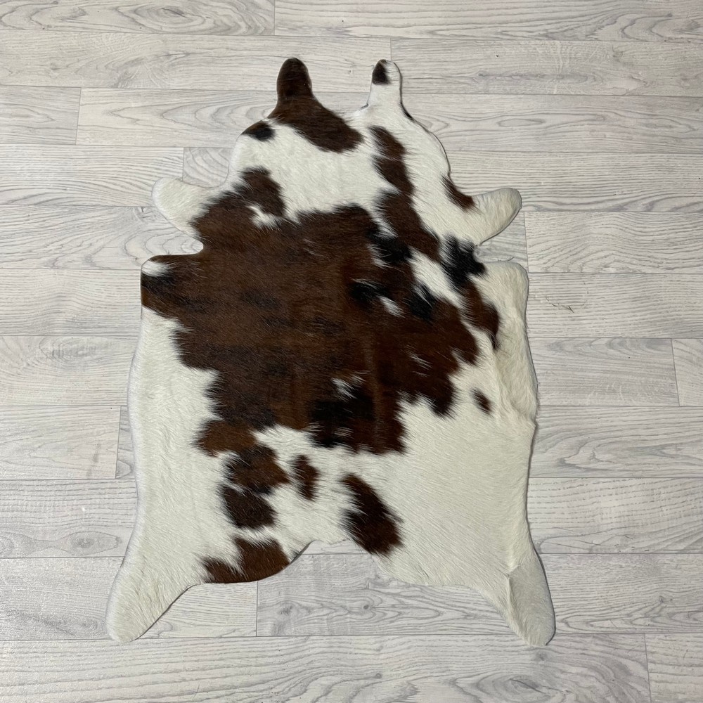 Lederstore Kleine koeienhuid bruin wit zwart (Normandiër) 90x60cm