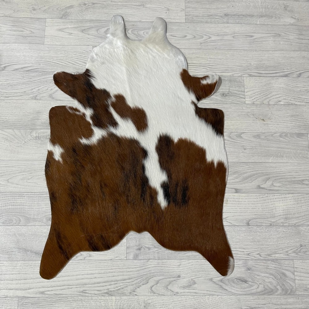 Lederstore Kleine koeienhuid bruin wit zwart (Normandiër) 90x60cm
