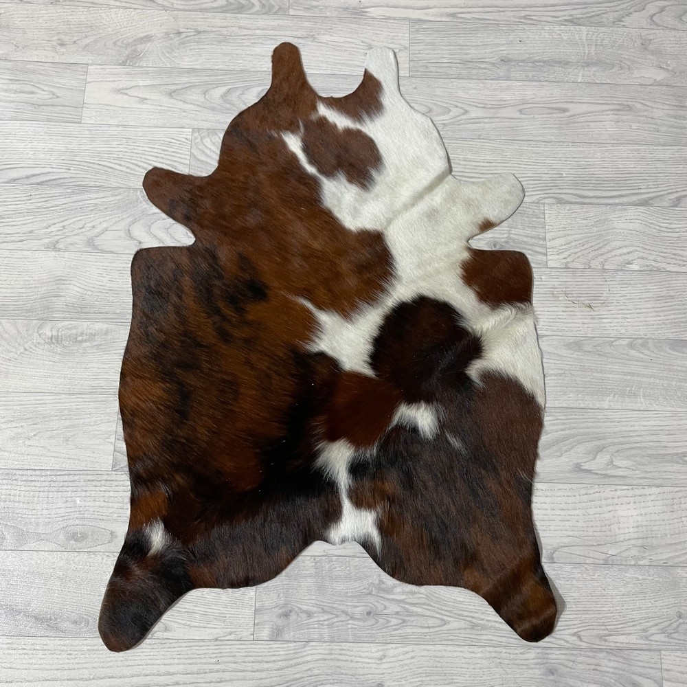 Lederstore Kleine koeienhuid bruin wit zwart (Normandiër) 90x60cm