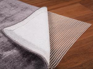 beliani Praktische Antirutschmatte für Teppiche weiß pvc zuschneidbar 110 x 140 cm balad - Weiß